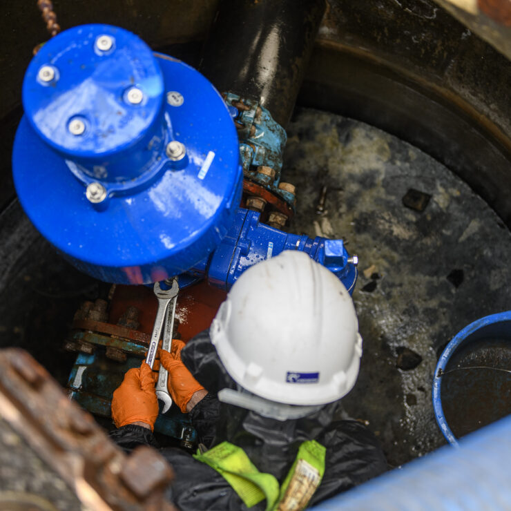 Pump engineer placing new pump in place | Remedials | Services | Anglo Pumps